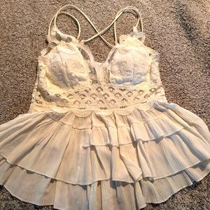 NWOT. Pretty and flirty top. Size large